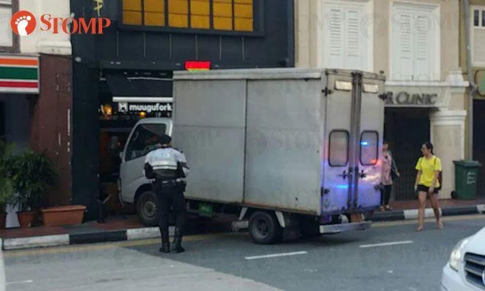 Lorry crashes into shopfront opposite Village Hotel at Victoria Street