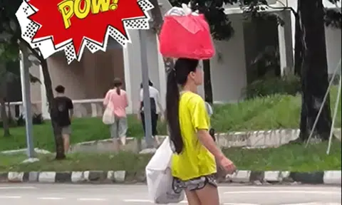 Woman hailed as 'amazing' for balancing groceries on her head in Bukit Batok