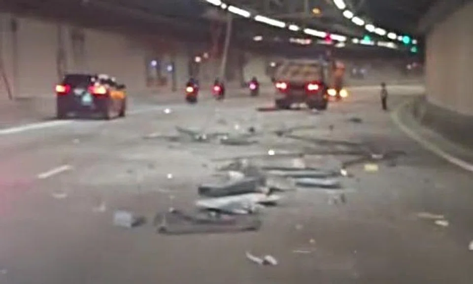 Stomper Happy alerted Stomp to online videos of the incident's aftermath that showed a traffic jam at the tunnel entrance due to lane closure and vehicles going around the debris strewn on the road in the tunnel.