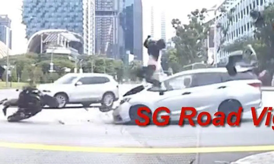 Driver arrested after allegedly running red light and sending motorcyclist flying at Stamford Road