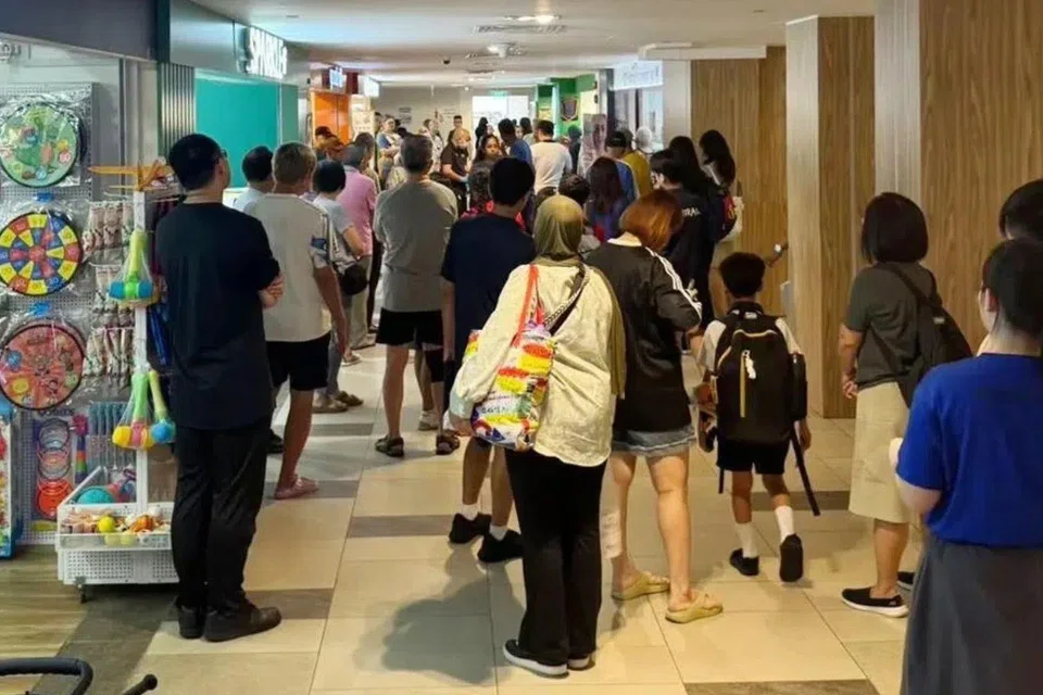 Bystanders gathered at the scene as some provided aid to the elderly man.