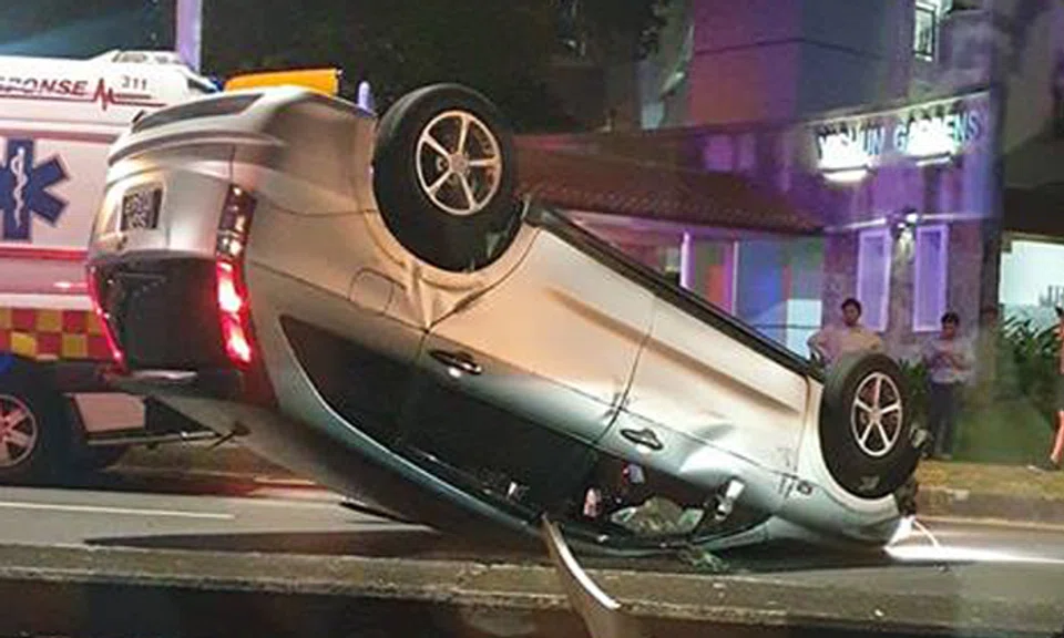 43-year-old driver taken to hospital after car overturns in Yishun ...