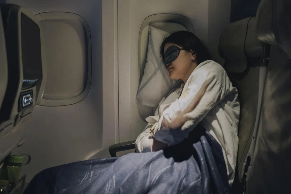 With some preparation before and during the flight, you may be able to get some quality sleep on a long-haul flight in economy class.