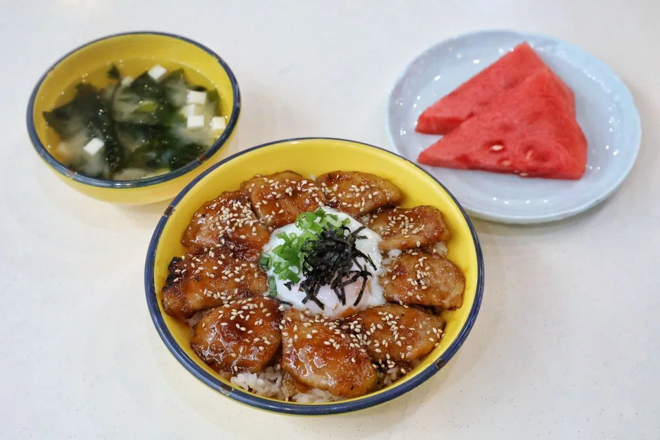 Pork Shogayaki Donburi comes with complimentary miso soup and watermelon.