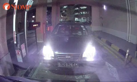Driver with no card in IU tailgates car out of Jurong West carpark