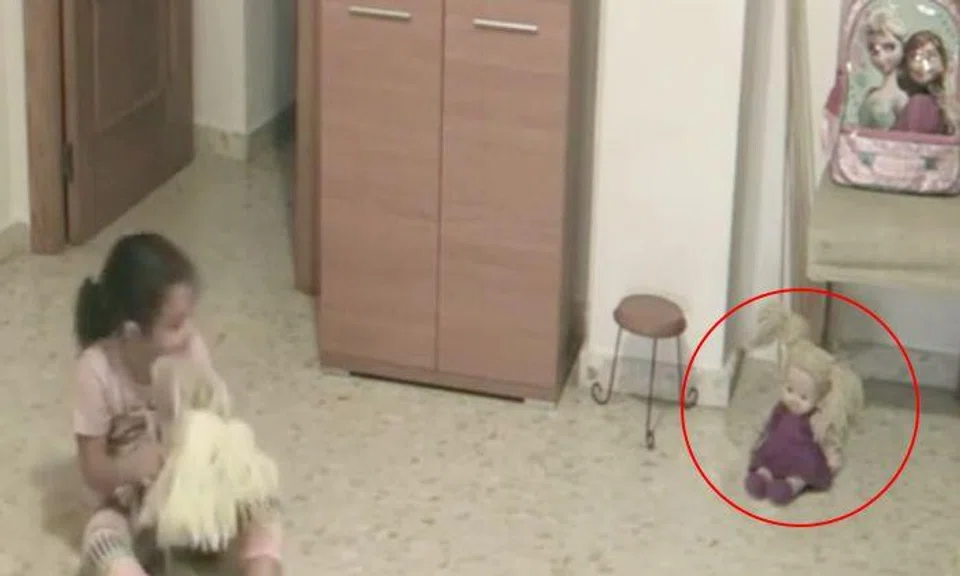 Doll moves on its own, objects flying off table in creepy video