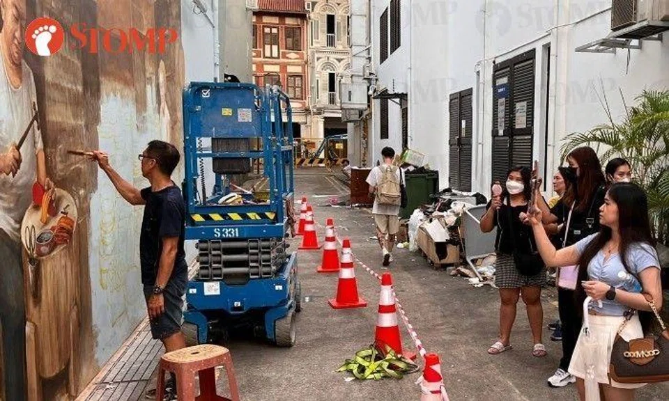 Artist painting mural in Chinatown: 'Embarrassing when visitors came by and saw all this rubbish'