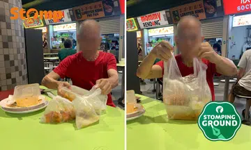 Man collects leftovers at Tampines hawker centre
