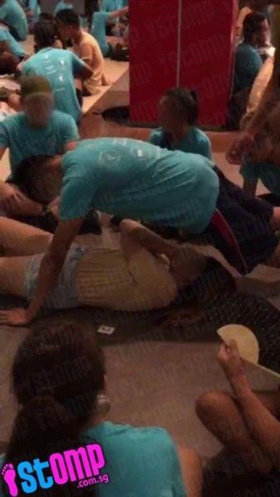 Is such a sexually-suggestive game allowed? Guy pushes crotch against girl's face during school orientation game
