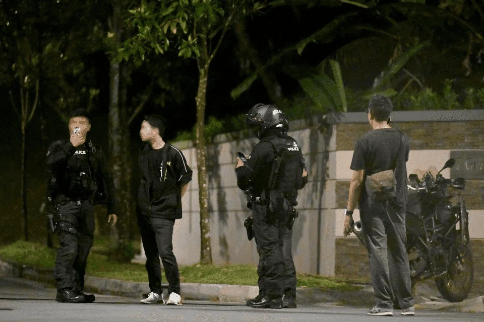 Police officers were stationed in the vicinity of Greenleaf Place on the night of Aug 8.