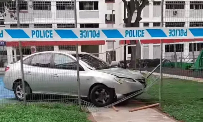 60-year-old driver taken to hospital after crashing car into Woodlands ...