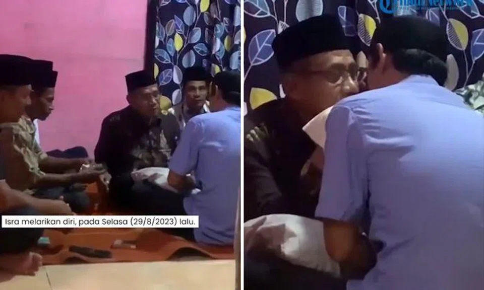 A video of the affair was published on Instagram, and shows a man wearing a long-sleeved batik shirt sitting opposite another, thought to be the father of the bride.