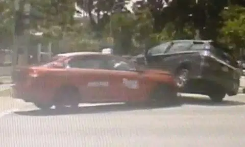Taxi beats red light and crashes into Toyota
