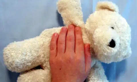 Man charged with molesting his 9-year-old son while boy was asleep