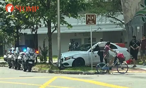 BMW crashes into lamp post in Jurong West, driver assisting with police investigations