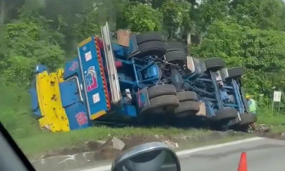 2 men taken to hospital after lorry topples on its side in Lim Chu Kang