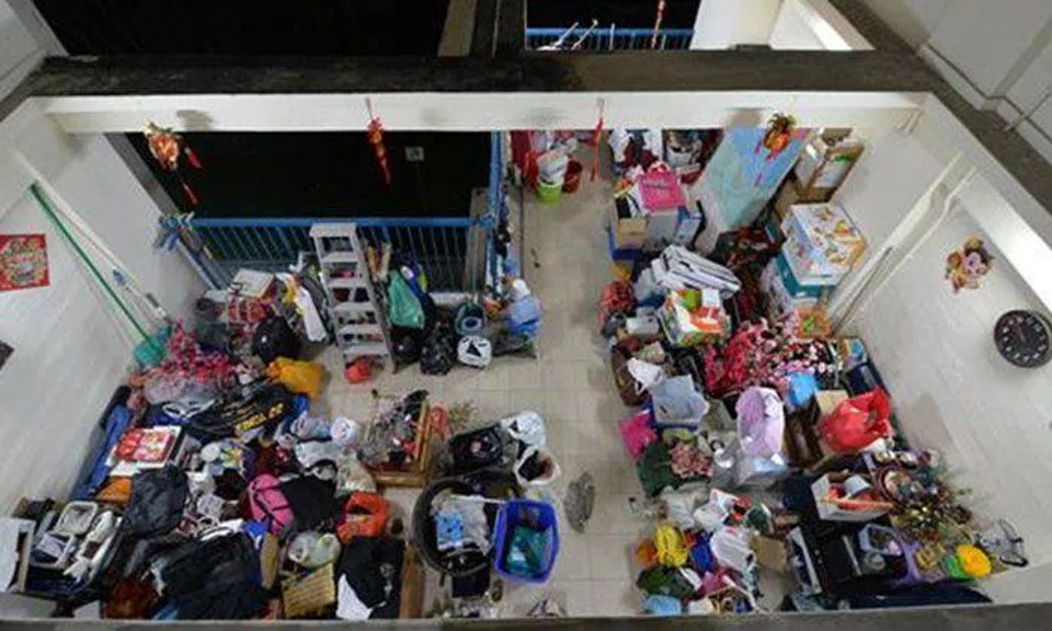 'Karung guni' clutters corridor at Holland Close with wares, operates recycling plant from rental flat