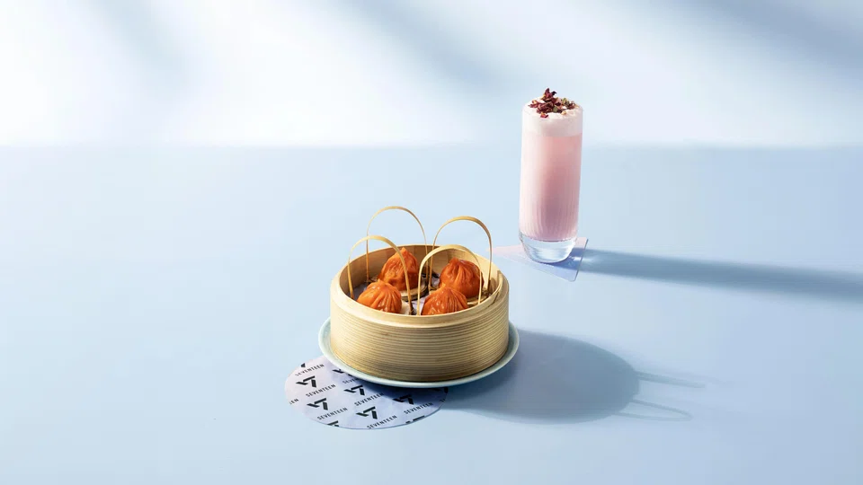 Mott 32’s The Polished Trio bundle sees the restaurant’s Hot & Sour Shanghainese Soup Dumplings served alongside its Wild Strawberry Fizz. PHOTO: MARINA BAY SANDS