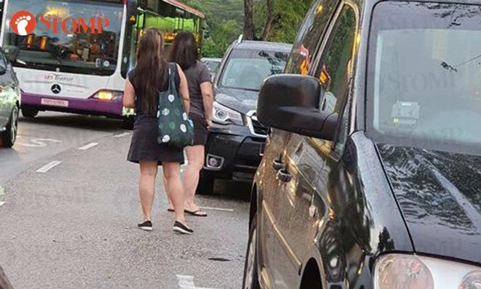Family 'chopes' Changi Village parking lot, physically blocks other car as 'we have waited very long'