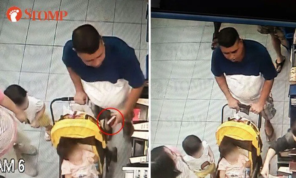 Couple with children caught on video taking phone at Bedok Sheng Siong supermarket