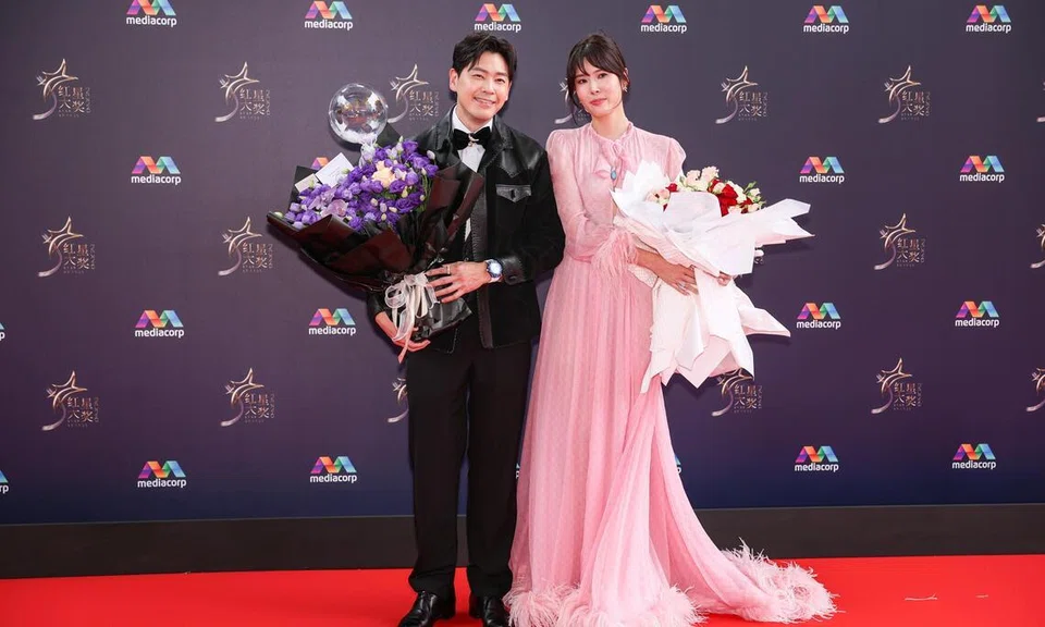 Actor Romeo Tan and actress Carrie Wong on the red carpet at the Star Awards at Mediacorp on April 19. 