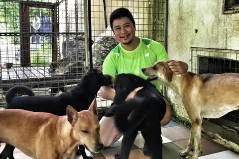Dr Siew shared that he would spend his time before and after work at the dog shelter to take care of the dogs.