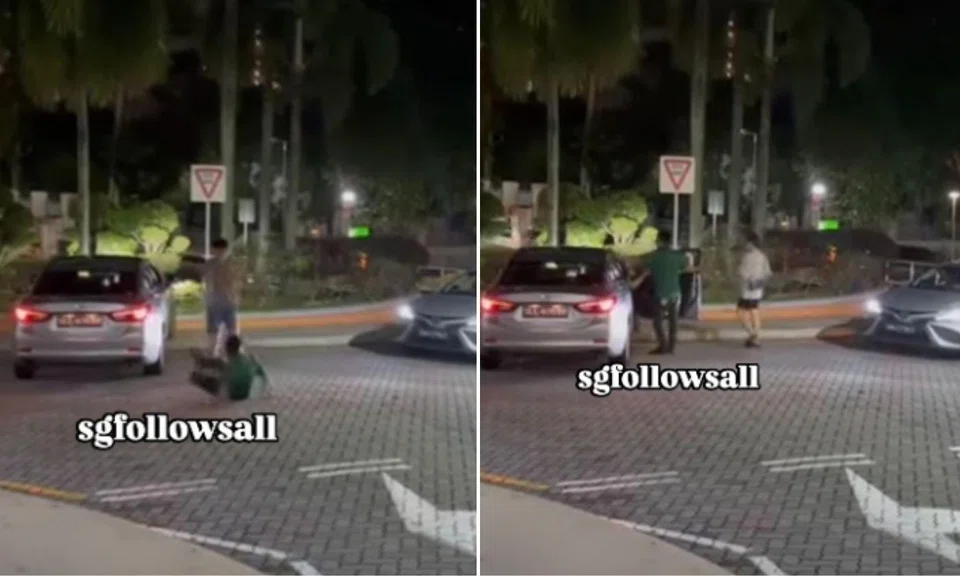 A man was seen dragging a driver out of a car during an altercation at a carpark entrance in Bedok Reservoir. 