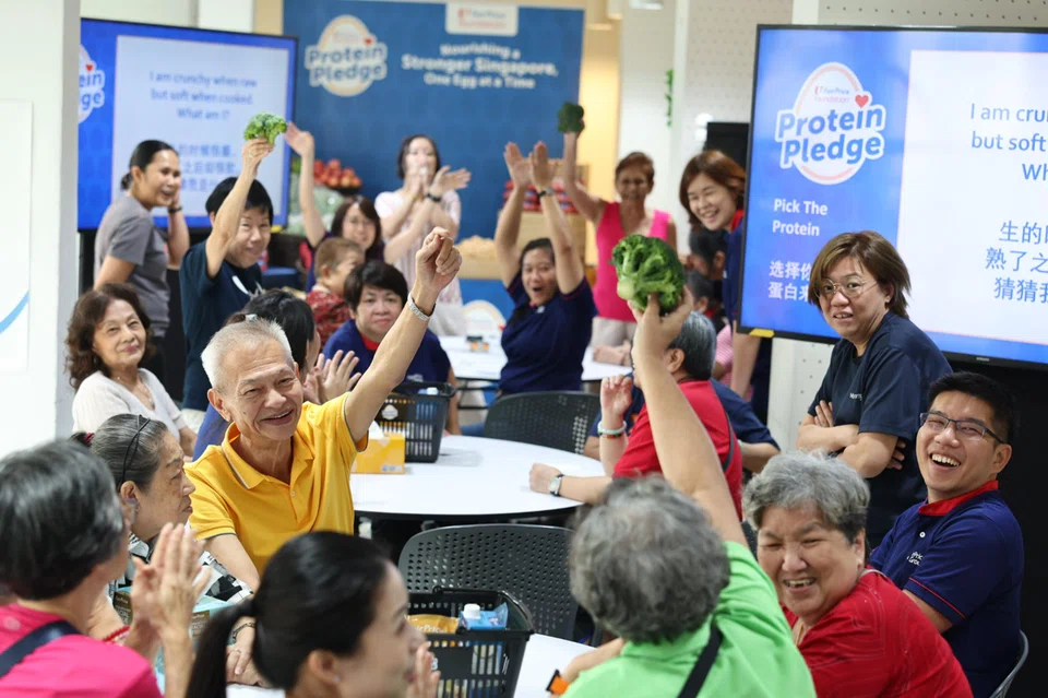 Senior residents from Marine Terrace engaging in games about nutrition on March 25.
