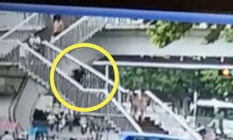 Woman in China falls down stairs to her death while using mobile phone