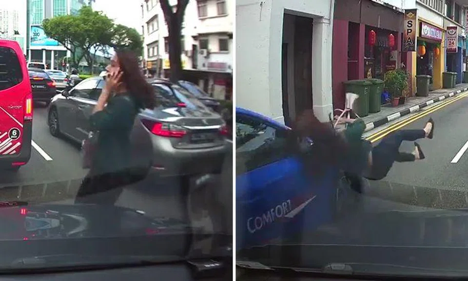 Woman learns painful lesson of how jaywalking while using your phone never ends well