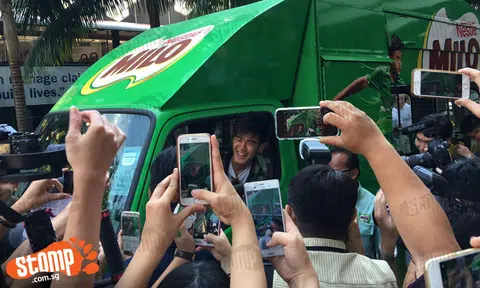 Is that... Nathan Hartono in the Milo Van?