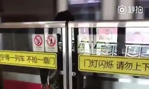 Shanghai woman escapes unscathed after being sandwiched in between train and platform doors