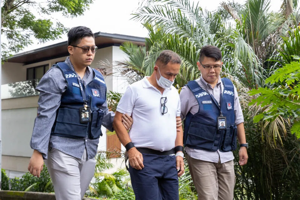 Hernando Giraldo Franco taken to a location where a car related to the case had allegedly been previously.