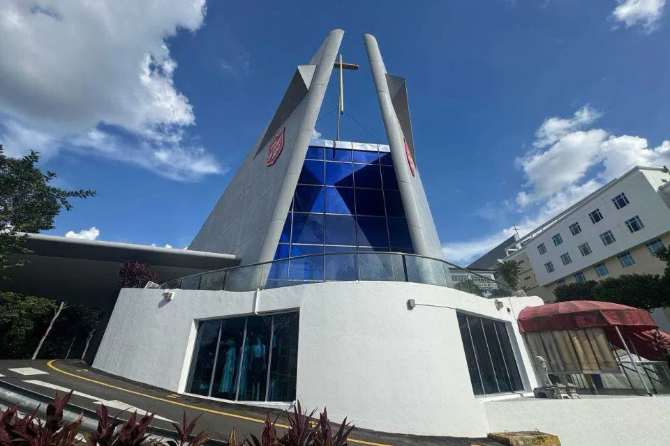 Graffiti was found scribbled on the walls and some parked vans at Praisehaven - The Salvation Army in Upper Bukit Timah Road on Christmas Day. ST PHOTO: CHONG JUN LIANG