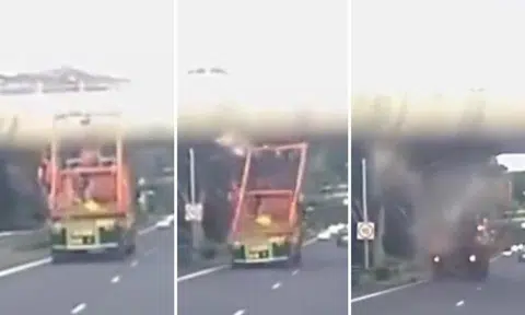 Driver arrested after top of his overheight trailer slams into bottom of Bedok North Flyover on PIE