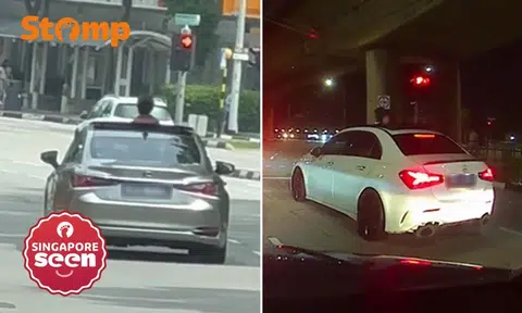 kids stick head out of sunroofs of cars on Singapore roads