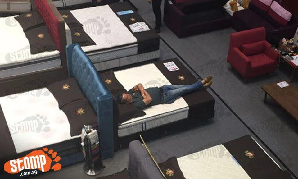 Like that also can ah? 'Sleeping Beauty' chills like a boss on display bed for over 30 minutes