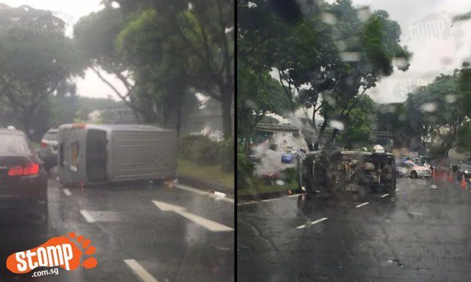 Silver van topples over at Adam Rd, massive jam ensues