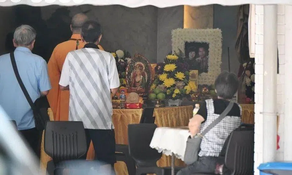 Relatives and friends attending the wake of an elderly couple who died at home together, at a funeral parlour in Sin Ming Drive, on Jan 6.