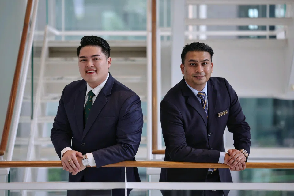 SIA premium services manager Bryan Lo (left) and passenger relations officer Shahfiee Sirajuddin assisted a wheelchair user who had an upset stomach and soiled his clothes after disembarking from his flight at Changi Airport in February. ST PHOTO: KEVIN LIM