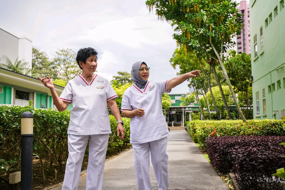 Ms Too Ah Kim (left), a senior midwife at what is now KK Women’s and Children’s Hospital, and Ms Saleha Kamsan, a staff midwife at the hospital.