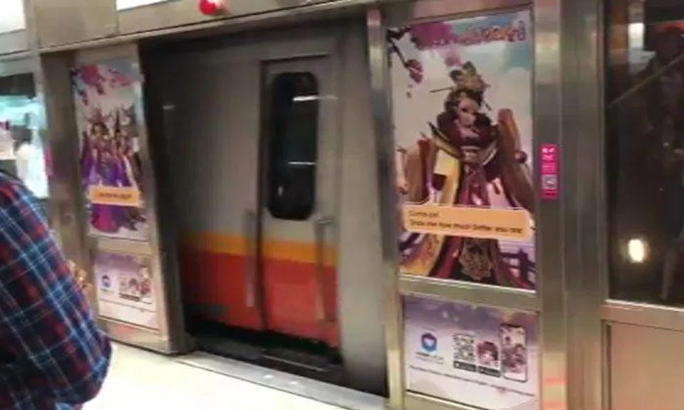 Fault leaves platform screen doors at Dhoby Ghaut station open, causes delay on North-South Line