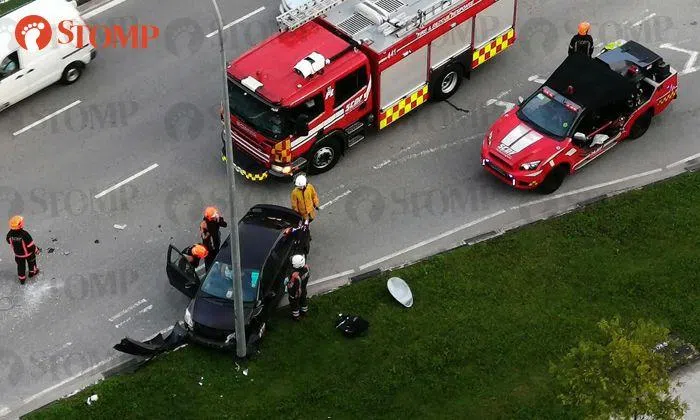 Woman taken to hospital after crashing car into lamppost in Bukit Batok ...