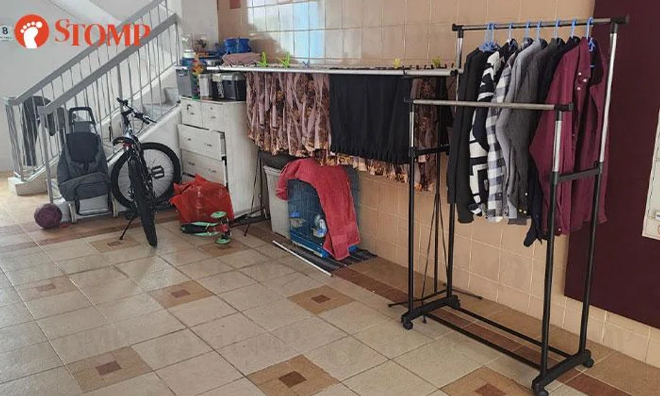 Yishun resident says neighbour has turned corridor into 'room', town council finds no obstruction