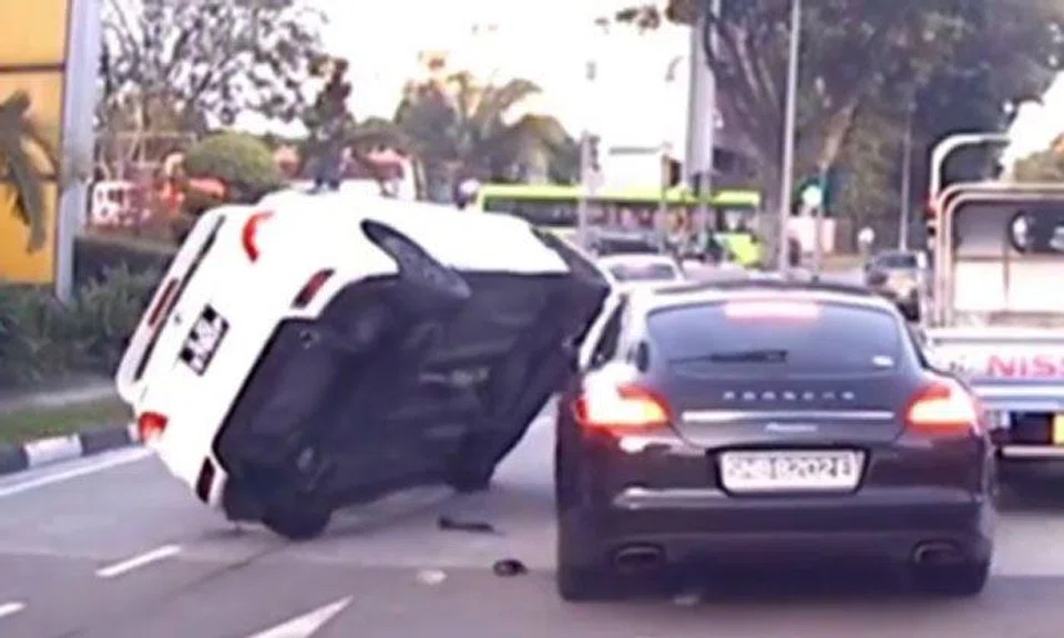 Toyota car flips after colliding into Porsche changing lanes at Ubi: Who is at fault?