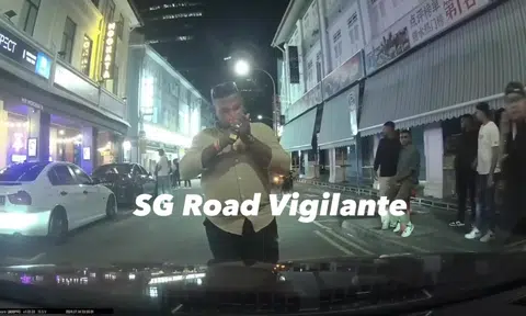 Man blocks car by standing in middle of road at 3.45am in Bugis and lights cigarette