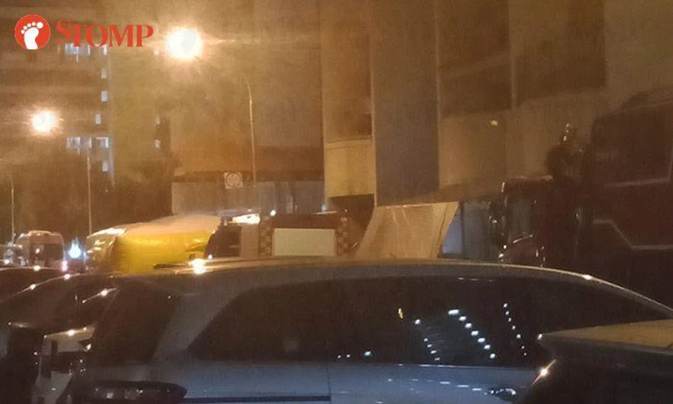 Man, 26, arrested after being brought to safety at Hougang HDB block