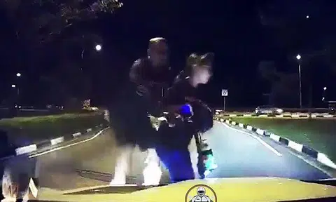 Driver knocks e-scooter user and pillion rider off device at zebra crossing