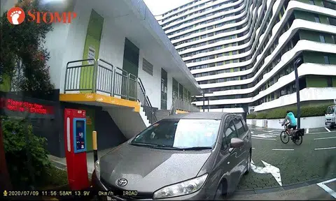 Toyota Wish driver 'die die' tailgates car out of Punggol carpark to avoid paying for parking