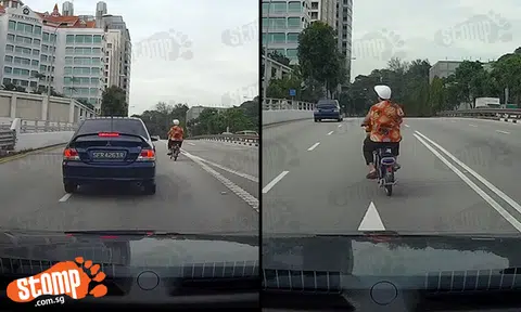 'Champion' e-biker tempts fate by cutting in front of oncoming cars -- thrice